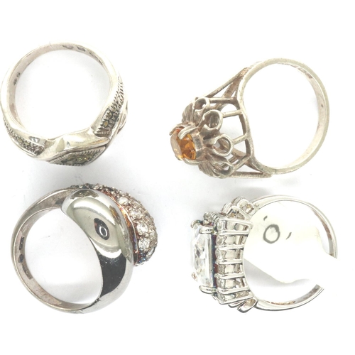 54 - Four 925 silver rings including stone set examples, sizes M-O. P&P Group 1 (£14+VAT for the first lo... 