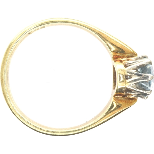 62 - 14ct gold ring set with a central topaz, marked 585, size L, 2.9g. P&P Group 1 (£14+VAT for the firs... 