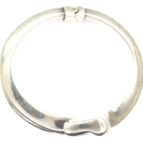 65 - 925 silver designer bangle, stamped A.C.E, D: 80 mm. P&P Group 1 (£14+VAT for the first lot and £1+V... 