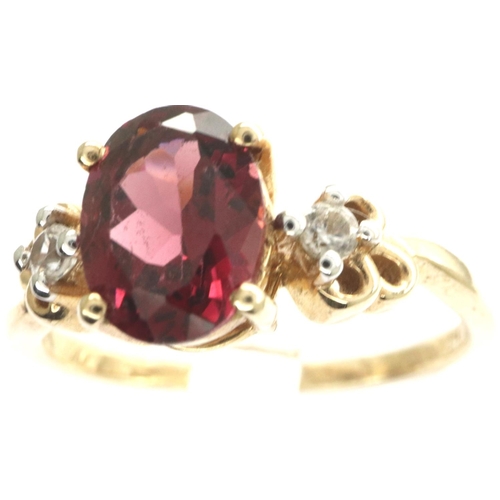 78 - 9ct gold garnet and diamond trilogy ring, size N/O, 2.4g. P&P Group 1 (£14+VAT for the first lot and... 