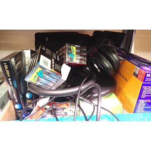 1051 - Box of mixed items including a Netgear 108 router, Vivanco SR110 headphones etc. Not available for i... 