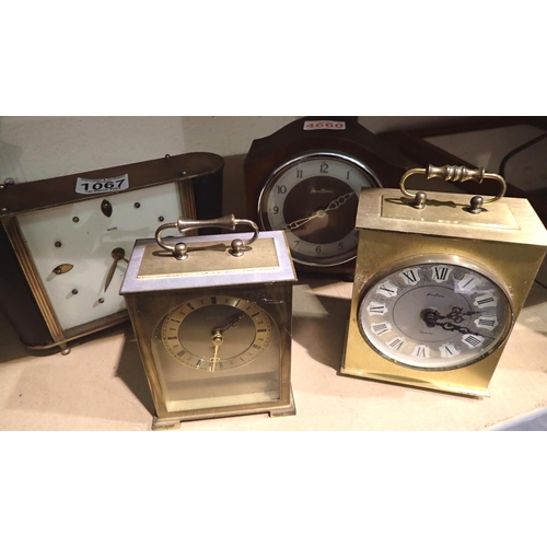 1067 - Four mantle/carriage clocks including Smiths and quartz examples. P&P Group 2 (£18+VAT for the first... 