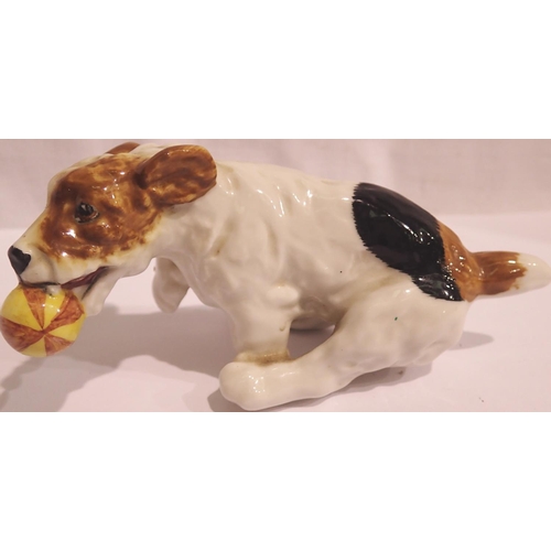 1119 - Royal Doulton ceramic dog, H: 10 cm. P&P Group 1 (£14+VAT for the first lot and £1+VAT for subsequen... 