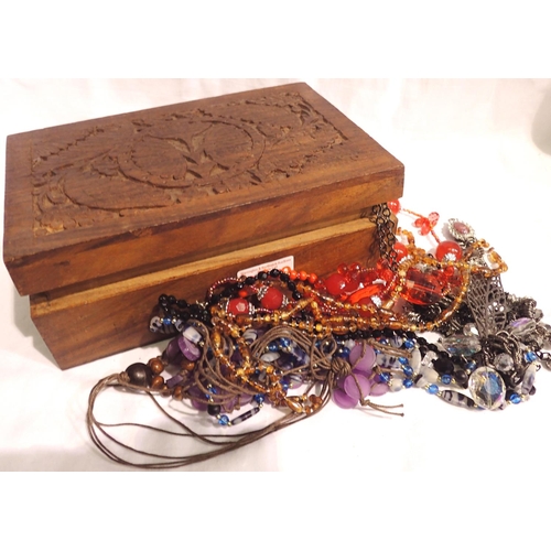 1126 - Collection of costume jewellery in a carved wooden box. P&P Group 1 (£14+VAT for the first lot and £... 