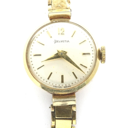 104 - 9ct gold Helvetia ladies wristwatch on a gold plated bracelet, working at lotting. P&P Group 1 (£14+... 