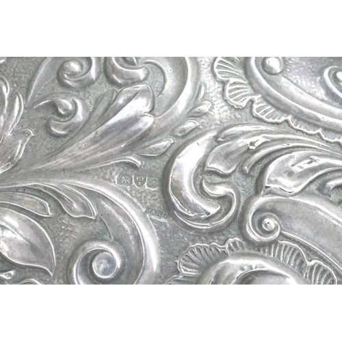 109 - Hallmarked silver hand mirror with floral decoration, Chester assay, H: 29 cm. P&P Group 2 (£18+VAT ... 