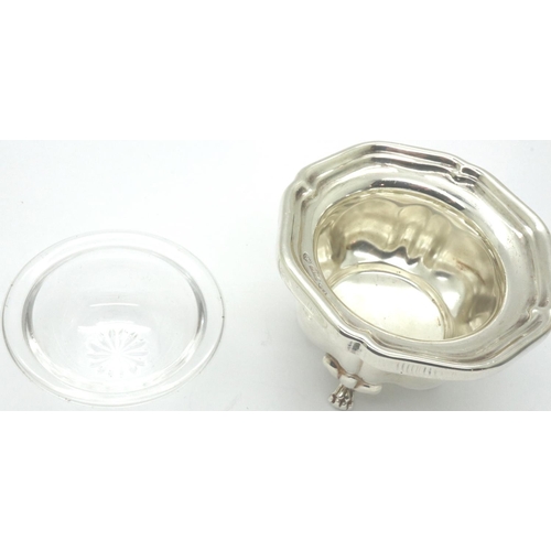 111 - Hallmarked silver open salt and liner on four foot suppports, H: 30 mm. P&P Group 1 (£14+VAT for the... 