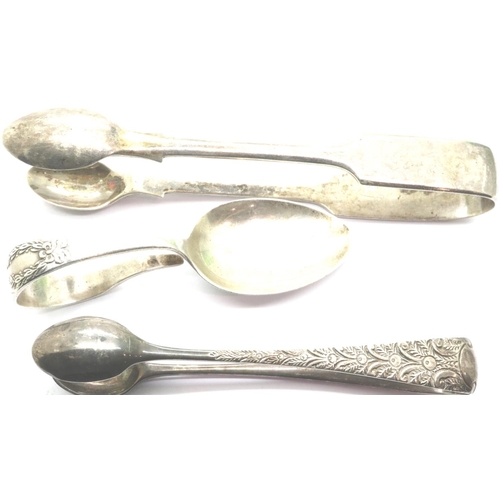 141 - Two pairs of hallmarked silver sugar tongues and a christening spoon, all Birmingham assay, combined... 