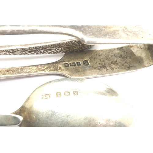 141 - Two pairs of hallmarked silver sugar tongues and a christening spoon, all Birmingham assay, combined... 