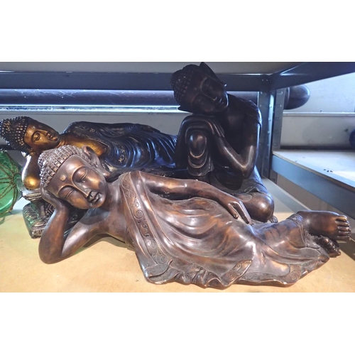 1205 - Three large cast reclining/sitting buddhas, largest L: 30 cm. Not available for in-house P&P