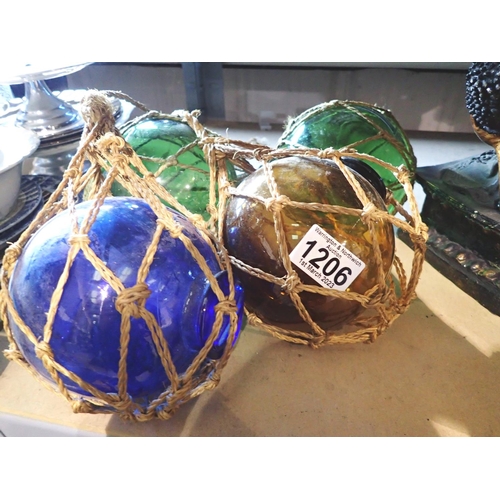 1206 - Four decorative coloured glass fishing pot float balls. Not available for in-house P&P