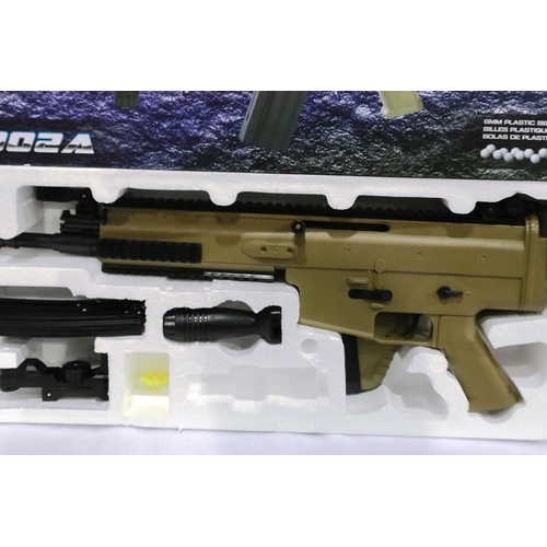 2025 - New old stock airsoft assault rifle, model 8902A, boxed. P&P Group 2 (£18+VAT for the first lot and ... 