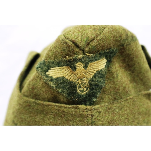 2163 - German WWII side cap with embroidered eagle, marked FM to lining. P&P Group 2 (£18+VAT for the first... 