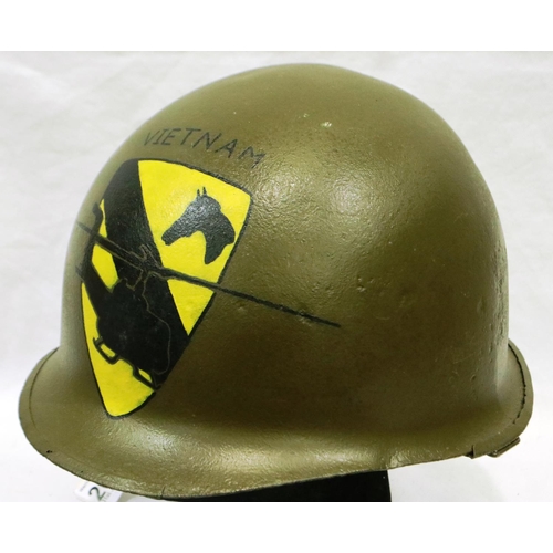 2177 - An American Vietnam war period M1 helmet, later painted with 1st Cavalry Division emblem. P&P Group ... 