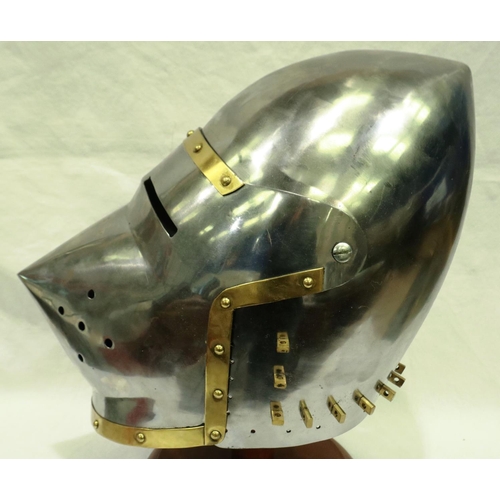 2181 - A replica steel nights helmet, brass mounted with visor and leather liner. P&P Group 2 (£18+VAT for ... 