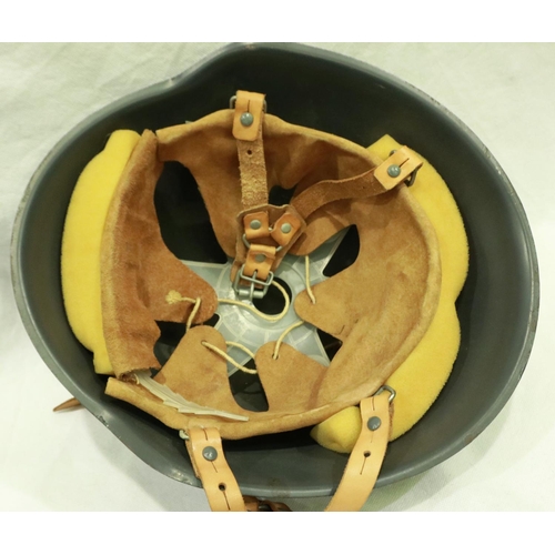 2182 - East German helmet with leather liner and a further example (2). P&P Group 3 (£25+VAT for the first ... 