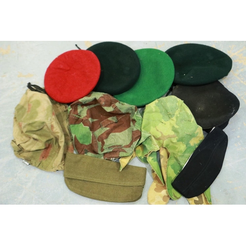 2188 - Three camouflage helmet covers, one dated 1944 and German WWII re-enactment SS side cap with date st... 