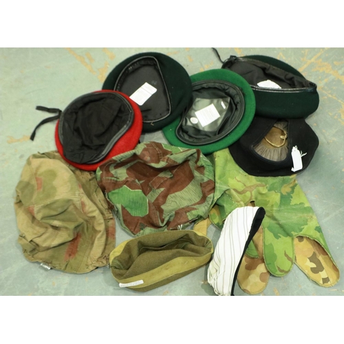 2188 - Three camouflage helmet covers, one dated 1944 and German WWII re-enactment SS side cap with date st... 