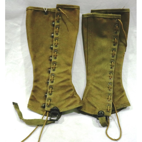 2202 - A pair of American WWII GI issue canvas gaiters, dated 1943 with laces and canvas straps. P&P Group ... 