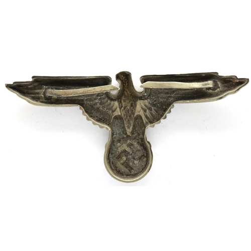 2289 - German WWII officers cap eagle, pressed metal with RZM mark verso. P&P Group 1 (£14+VAT for the firs... 