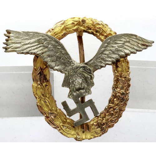 2311 - A Luftwaffe combined pilots/ observer badge, two-part construction marked Schwerin verso. P&P Group ... 