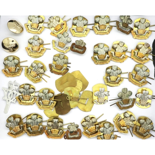 2319 - Thirty South Lancashire regiment cap badges. P&P Group 1 (£14+VAT for the first lot and £1+VAT for s... 