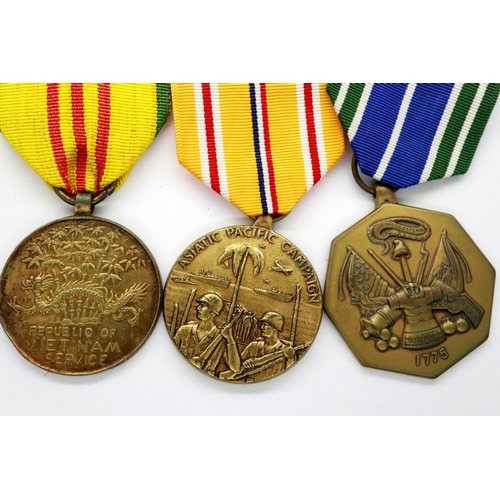 2329 - Three American military medals: Vietnam Service, Military Achievement and Asiatic Pacific Campaign. ... 