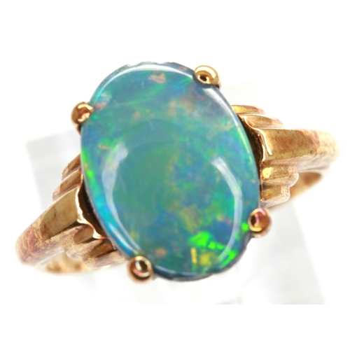 55 - 9ct gold ring set with an opal, size M, 1.9g. P&P Group 1 (£14+VAT for the first lot and £1+VAT for ... 