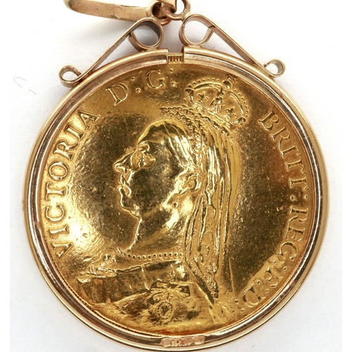 6 - 1887 Victoria double sovereign loosely mounted in 9ct gold, 17.8g. P&P Group 1 (£14+VAT for the firs... 