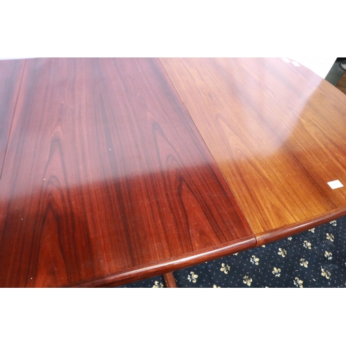 2078 - Skovby Danish Rosewood extending dining table on end supports with single stretcher, two additional ... 