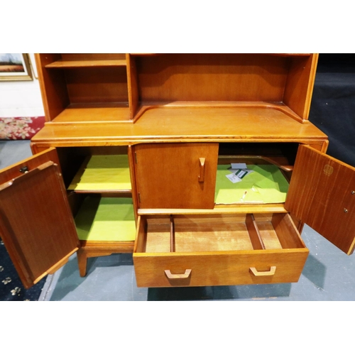 2081 - E Gomme for G Plan, an asymmetric teak buffet, lower cupboard with integrated drinks tray, upstand w... 