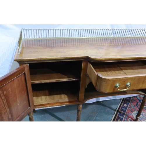 2112 - A Regency walnut breakfront sideboard cross banded with reeded supports and brass gallery, 183 x 50 ... 