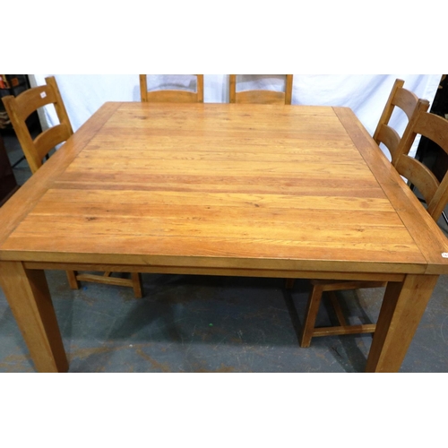 2126 - A substantial golden oak dining table with a set of four ladder back chairs, table 160 x 160 x 79 cm... 