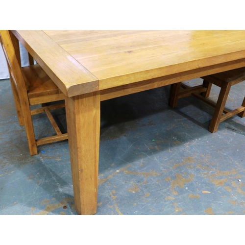 2126 - A substantial golden oak dining table with a set of four ladder back chairs, table 160 x 160 x 79 cm... 