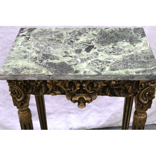 2092 - A 20th century gilt console or lamp table, with gilt wood support and green marble top, 46 x 30 x 76... 