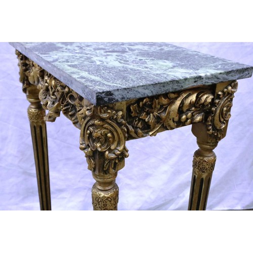 2092 - A 20th century gilt console or lamp table, with gilt wood support and green marble top, 46 x 30 x 76... 