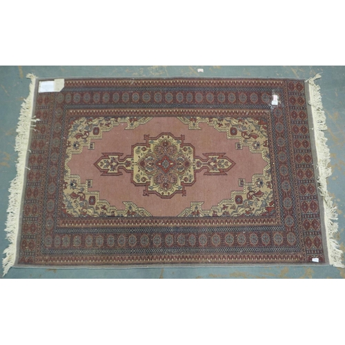 2071C - A 20th century Middle Eastern hand knotted floor rug, fringed, 180 x 120 cm. Not available for in-ho... 