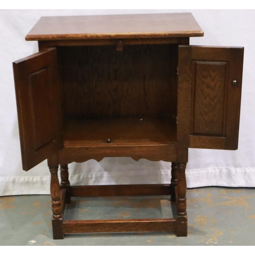 2131 - A 20th century oak two door cabinet in the Priory style, 51 x 33 x 78 cm H. Not available for in-hou... 