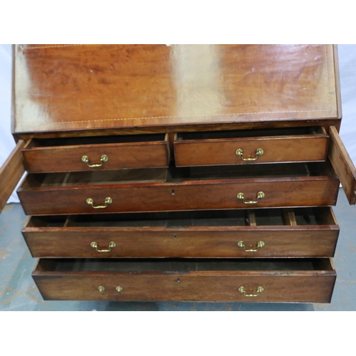 2136 - George III walnut fall front bureau, inlaid and fitted with pigeon holes, drawers and secret compart... 