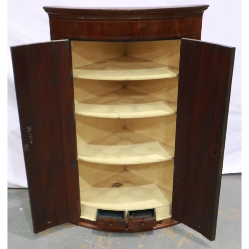 2144 - A George III walnut wall hanging corner cupboard, barrel front with three interior shelves, W: 76 cm... 