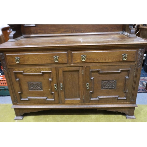 2153 - A Victorian mahogany mirror-back dresser, with carved and panelled doors, two drawers and bevelled g... 