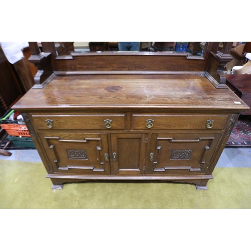 2153 - A Victorian mahogany mirror-back dresser, with carved and panelled doors, two drawers and bevelled g... 