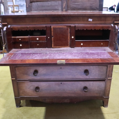 2155 - A Victorian walnut secretaire chest, the fitted top drawer above three further drawers and raised on... 