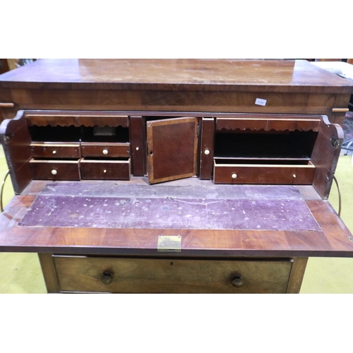 2155 - A Victorian walnut secretaire chest, the fitted top drawer above three further drawers and raised on... 