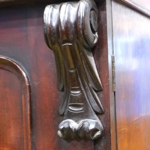 2156 - A late 19th century mahogany linen press, the cupboard top with four slides above a chest base, 117 ... 