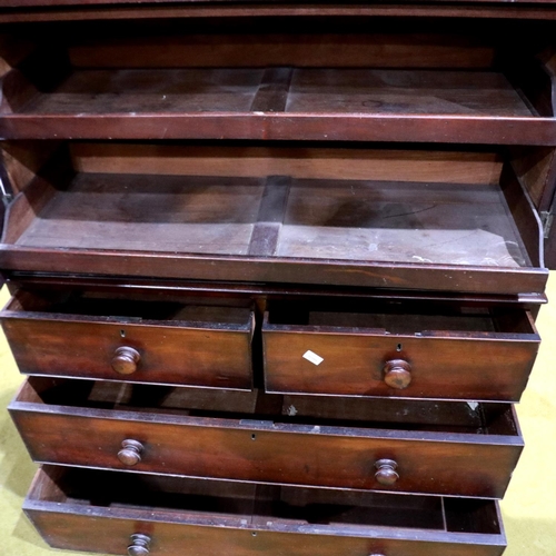 2156 - A late 19th century mahogany linen press, the cupboard top with four slides above a chest base, 117 ... 