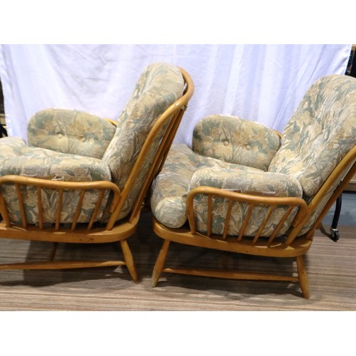 2074A - A pair of Ercol mid 20th century blonde elm Jubilee armchairs, surface wear throughout the frames bu... 