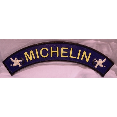 1044 - Cast iron curved Michelin sign, W: 40 cm. P&P Group 1 (£14+VAT for the first lot and £1+VAT for subs... 