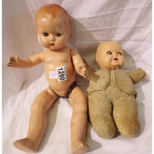 1280 - Two vintage dolls with clothes, both damaged. P&P Group 2 (£18+VAT for the first lot and £3+VAT for ... 