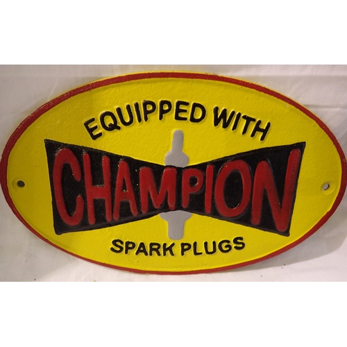 1284 - Cast iron Champion Spark plugs sign, W: 25 cm. P&P Group 1 (£14+VAT for the first lot and £1+VAT for... 